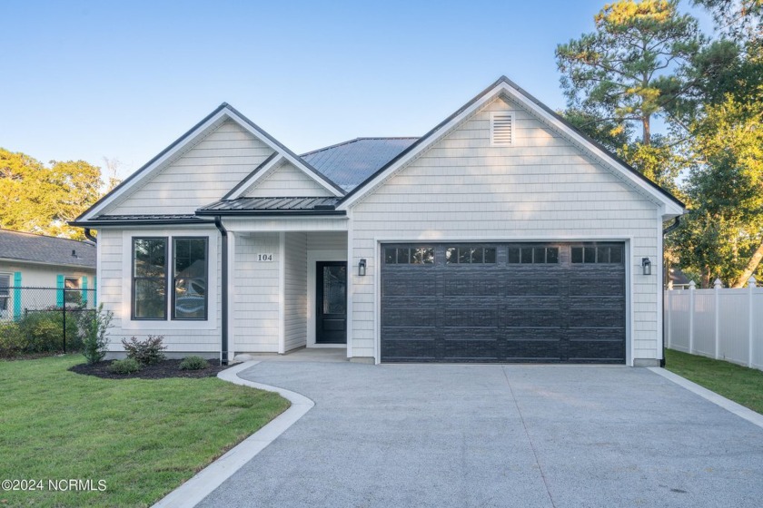 This stunning new construction home is 1489 heated sqft of - Beach Home for sale in Oak Island, North Carolina on Beachhouse.com