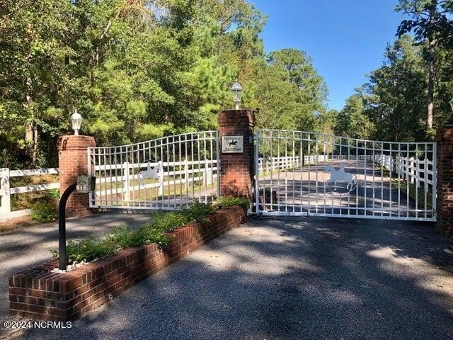 Phenomenal investment! Over 4 beautiful acres in the private - Beach Acreage for sale in Leland, North Carolina on Beachhouse.com