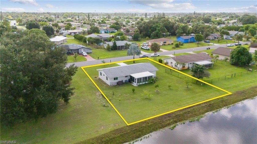 CANAL PROPERTY WITH IMPACT WINDOWS AND NEW APPLIANCES!! Welcome - Beach Home for sale in Lehigh Acres, Florida on Beachhouse.com