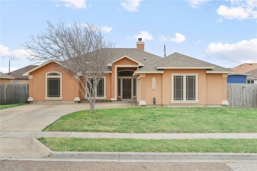 Welcome to this beautifully maintained 4-bedroom, 2-bath stucco - Beach Home for sale in Corpus Christi, Texas on Beachhouse.com