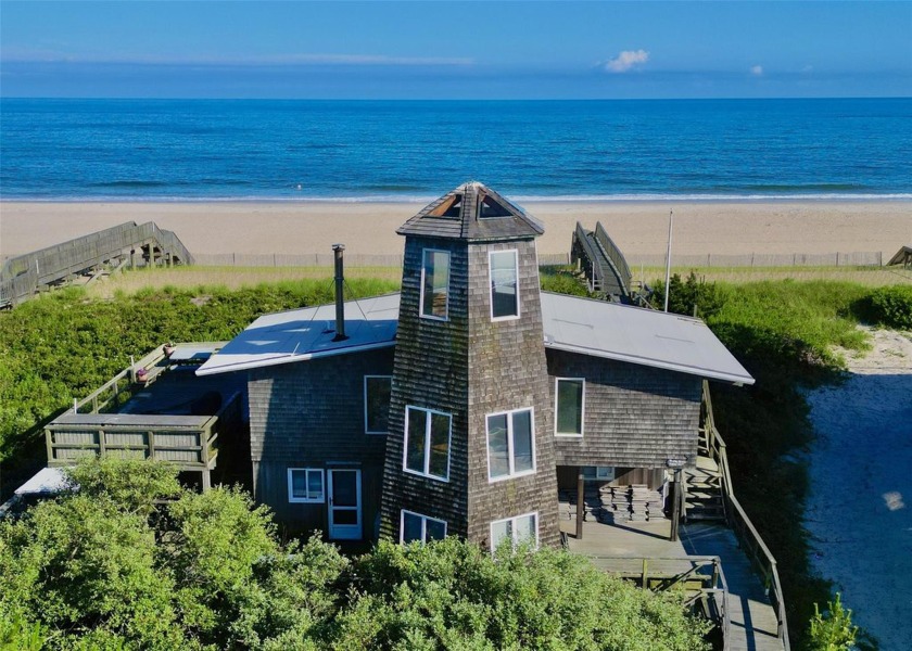 Welcome to The Tower House, a renowned architectural gem perched - Beach Home for sale in Davis Park, New York on Beachhouse.com