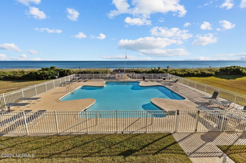 With alluring waterfront views of the Atlantic Ocean, this - Beach Condo for sale in Atlantic Beach, North Carolina on Beachhouse.com