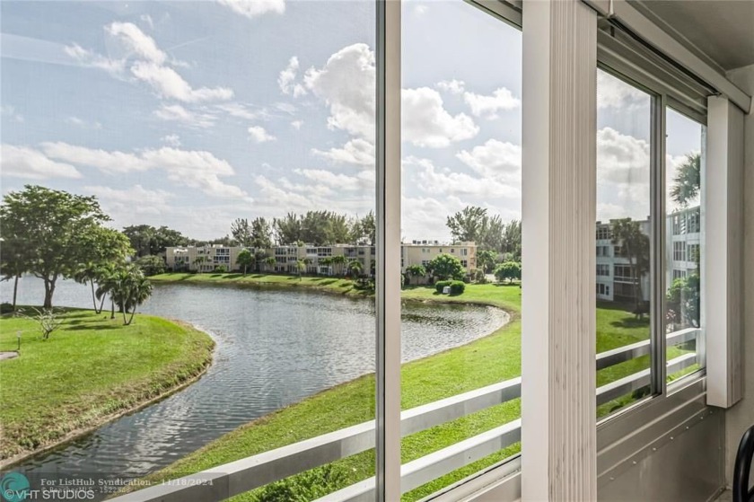 Beautifully renovated 2/2 corner unit with serene water Views in - Beach Condo for sale in West Palm Beach, Florida on Beachhouse.com