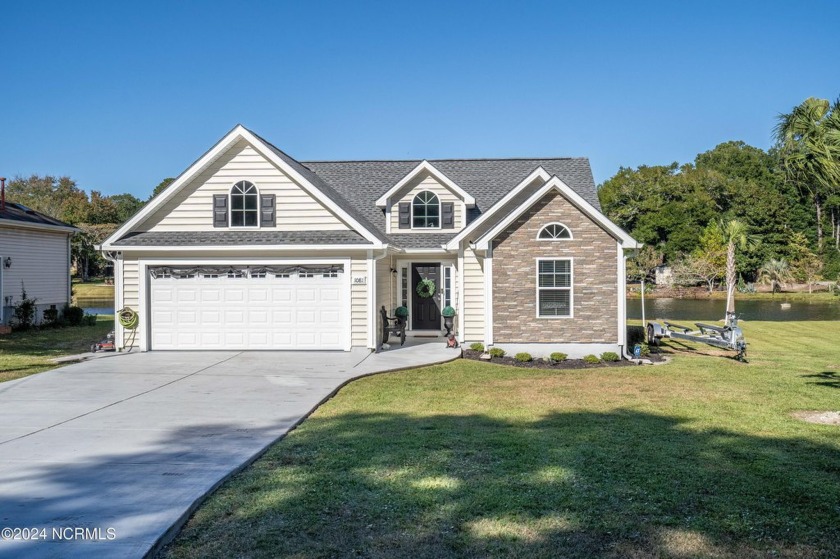 Welcome Home to Calabash Acres! This custom home built in 2022 - Beach Home for sale in Calabash, North Carolina on Beachhouse.com