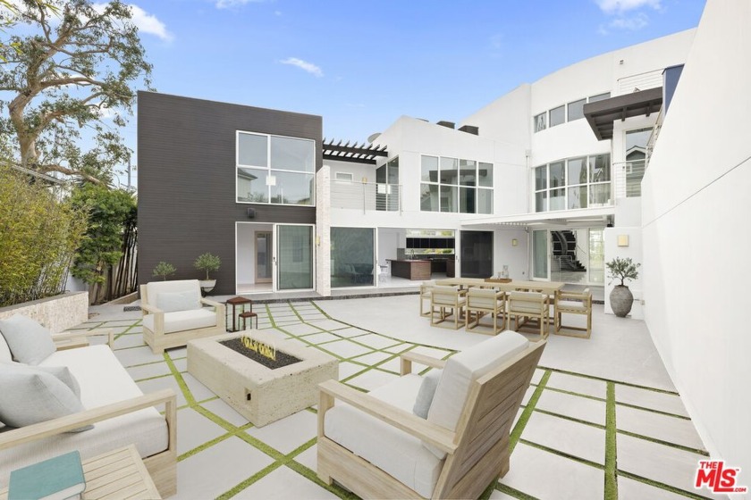 Introducing an architectural masterpiece at 16991 W Sunset Blvd - Beach Home for sale in Pacific Palisades, California on Beachhouse.com