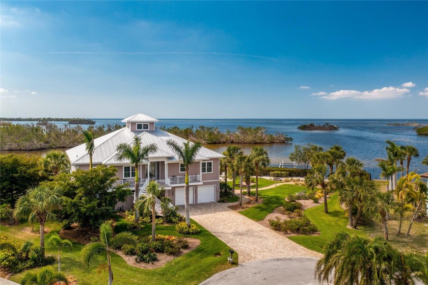 A modern twist on old Florida living - this waterfront oasis is - Beach Home for sale in Punta Gorda, Florida on Beachhouse.com