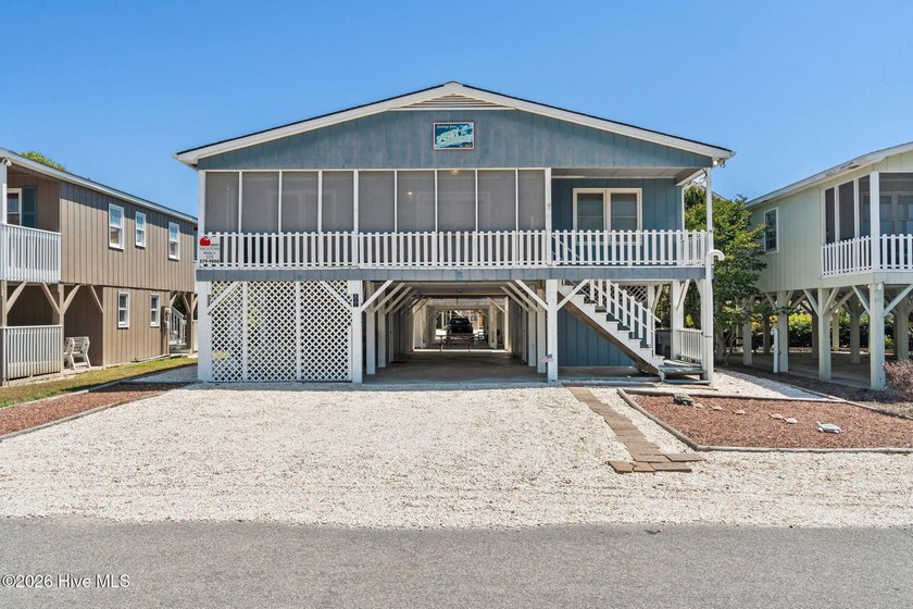 Discover coastal charm in this beautifully furnished 5-bedroom - Beach Home for sale in Sunset Beach, North Carolina on Beachhouse.com