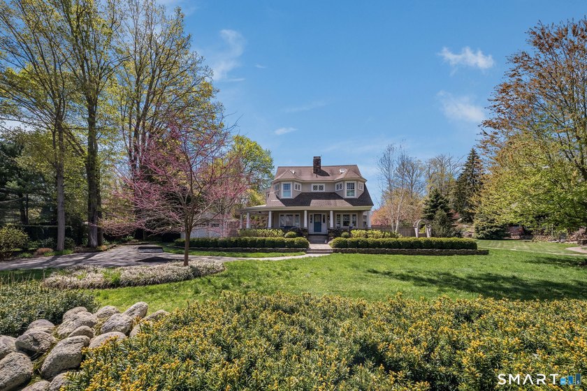 The historic c. 1904 Scranton Homestead, described as a Colonial - Beach Home for sale in Madison, Connecticut on Beachhouse.com