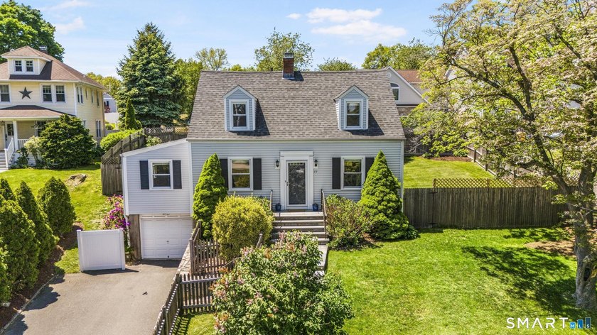 Fabulous 4-bedroom expanded Cape in a highly sought-after - Beach Home for sale in Fairfield, Connecticut on Beachhouse.com