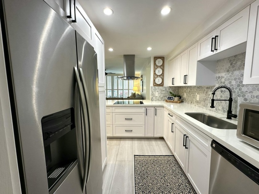 This beautifully renovated property offers the perfect blend of - Beach Condo for sale in Juno Beach, Florida on Beachhouse.com