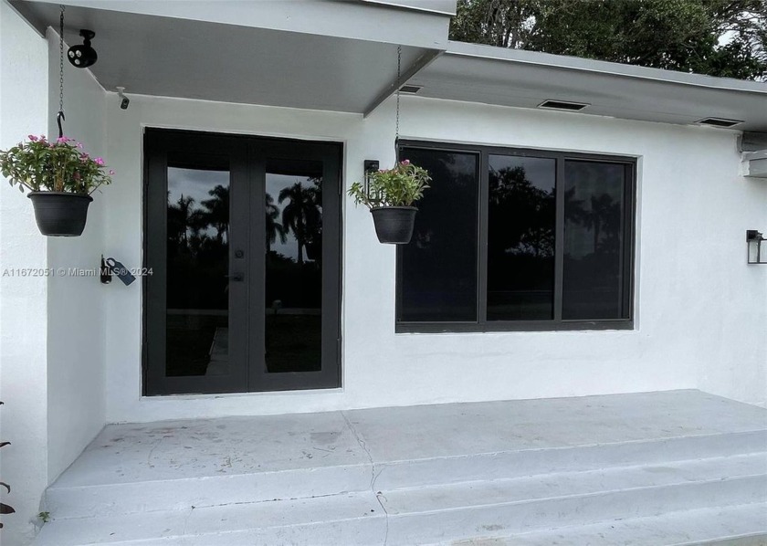 Secluded waterfront home that boasts a 4-bedroom, 3-bathroom - Beach Home for sale in Miami, Florida on Beachhouse.com