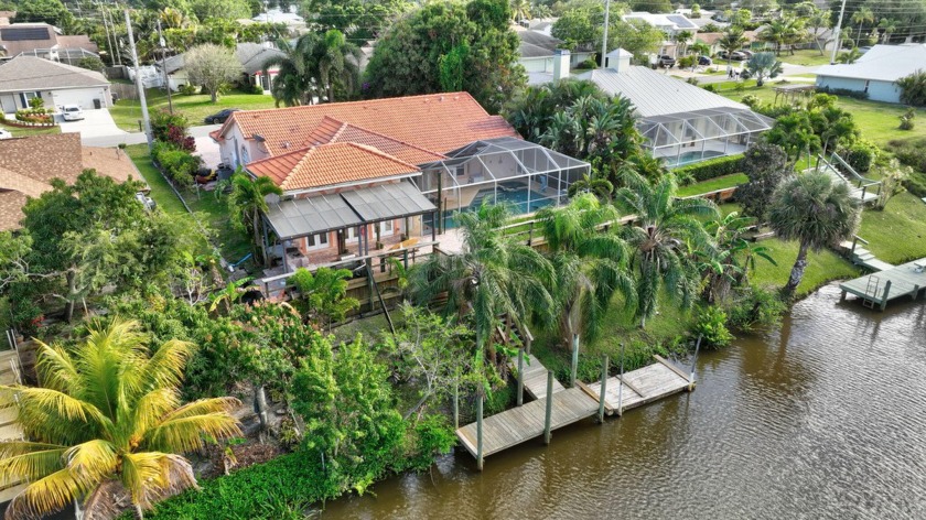 Welcome to your dream waterfront oasis! Nestled along the - Beach Home for sale in Port Saint Lucie, Florida on Beachhouse.com