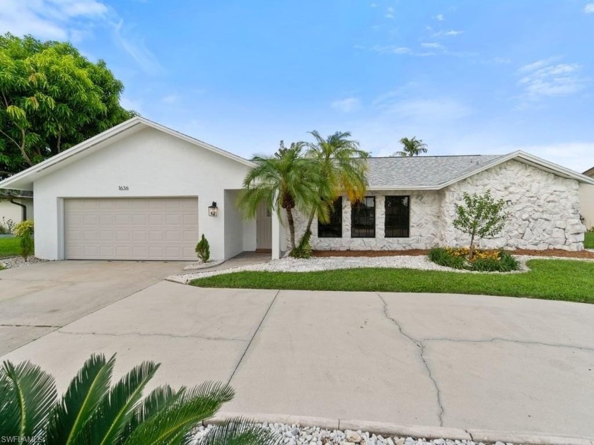 Welcome to your dream home in the sought-after Whiskey Creek - Beach Home for sale in Fort Myers, Florida on Beachhouse.com