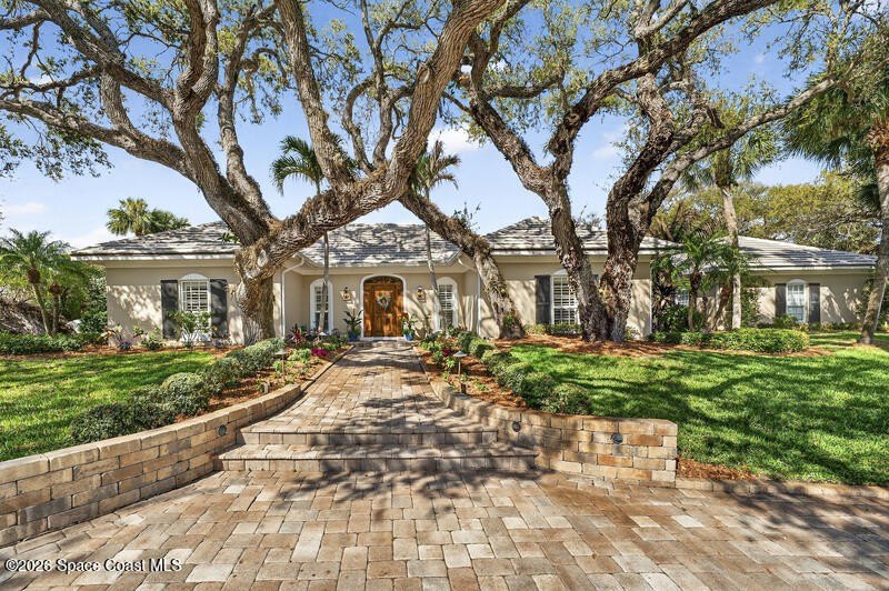 Beautiful Oak canopied corner .54 acre lot in well established - Beach Home for sale in Indian River Shores, Florida on Beachhouse.com