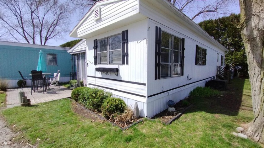 Welcome to your delightful retreat on the beautiful shores of - Beach Home for sale in Lexington, Michigan on Beachhouse.com