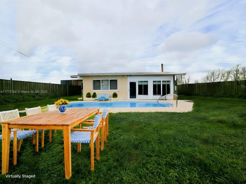 Discover this charming 3-bed, 2-bath home with a 2024 roof and - Beach Home for sale in Hollywood, Florida on Beachhouse.com