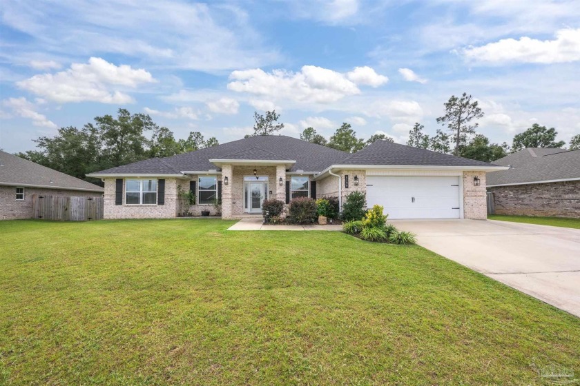 Welcome to this stunning 2021 brick home, thoughtfully crafted - Beach Home for sale in Milton, Florida on Beachhouse.com