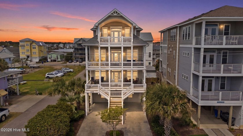Experience coastal luxury in this stunning open-concept retreat - Beach Home for sale in Carolina Beach, North Carolina on Beachhouse.com
