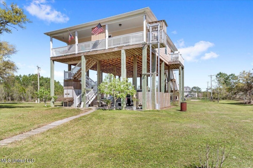 Welcome to your waterfront retreat! With 2089 square feet of - Beach Home for sale in Pass Christian, Mississippi on Beachhouse.com
