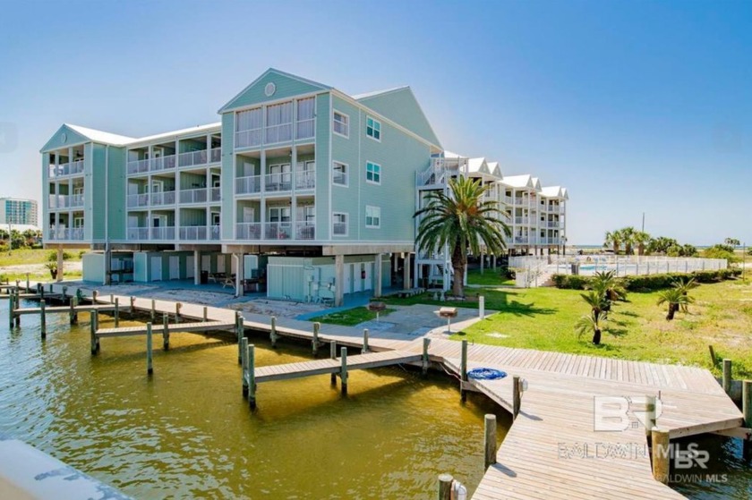 Welcome to this stunning 2-bedroom, 2-bathroom waterfront condo - Beach Home for sale in Orange Beach, Alabama on Beachhouse.com