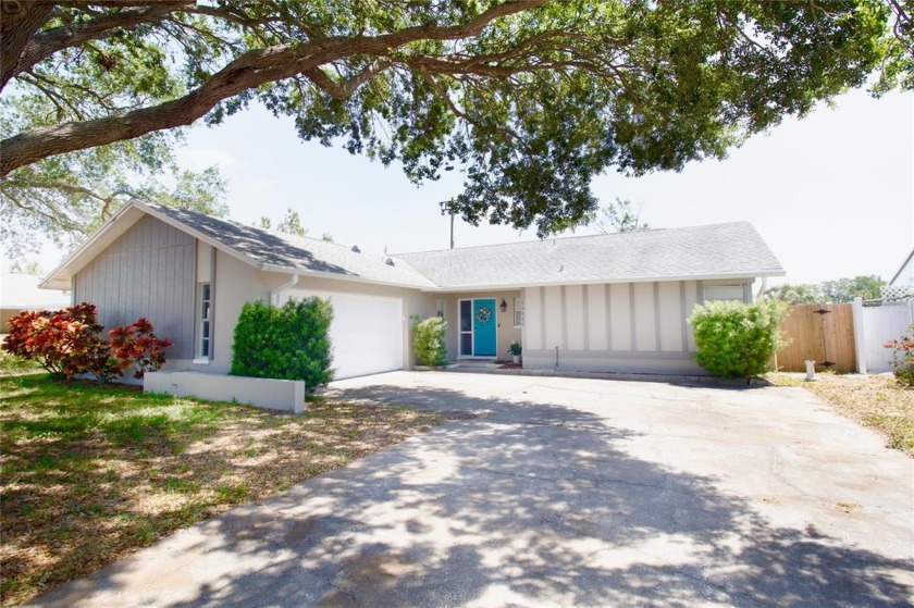 This elegant and spacious Four Bedroom, Two Bathroom Home sits - Beach Home for sale in Seminole, Florida on Beachhouse.com