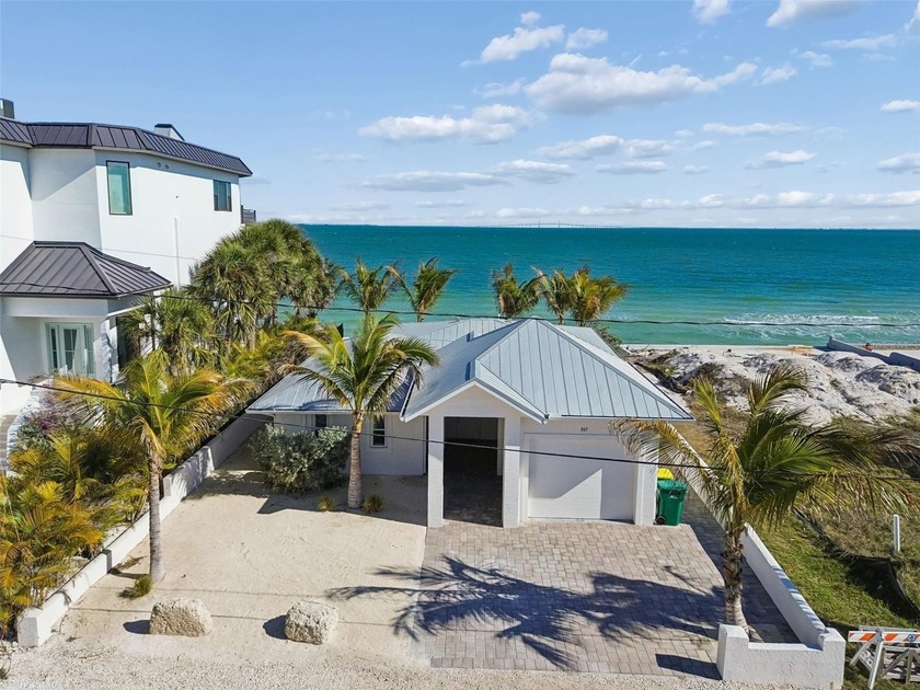 Fully updated, beach front stunner! Situated on the highly - Beach Home for sale in Anna Maria, Florida on Beachhouse.com