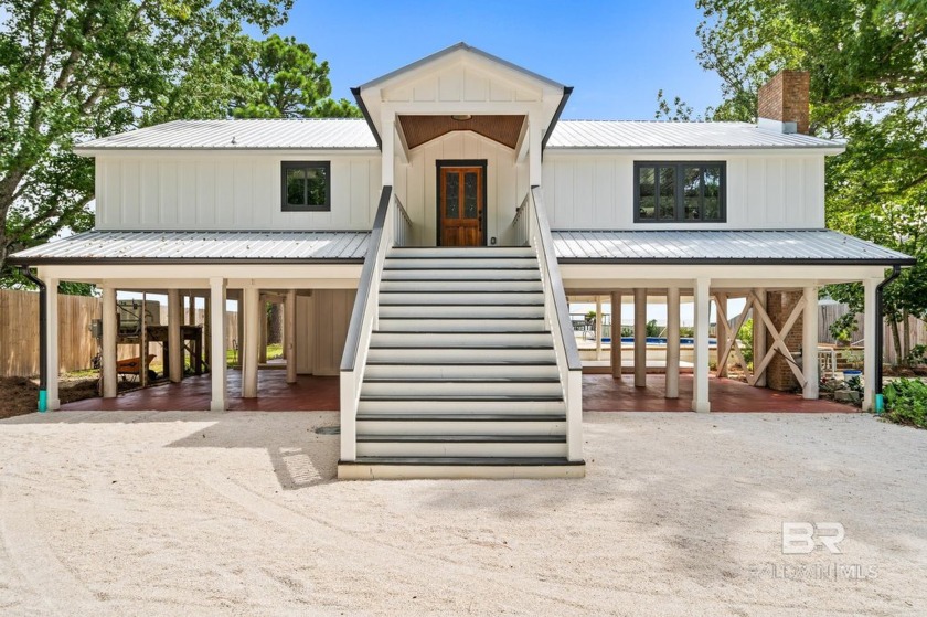 Discover paradise at this beautifully updated home on Mobile Bay - Beach Home for sale in Fairhope, Alabama on Beachhouse.com