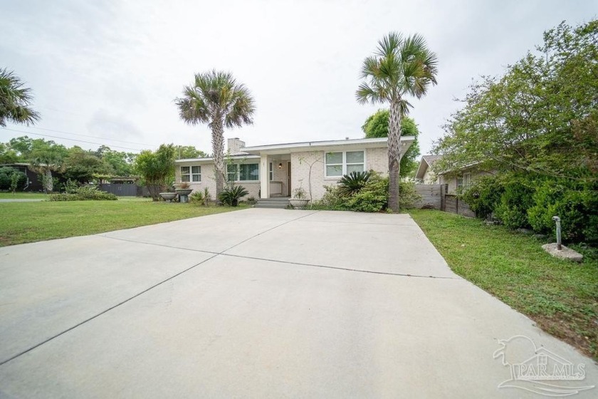 Beautifully and carefully renovated from top to bottom, this - Beach Home for sale in Pensacola, Florida on Beachhouse.com
