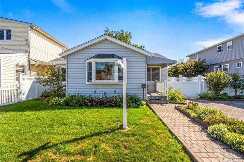 Amazing curb appeal on this Diamond 3 Bedroom 1 bath Ranch in - Beach Home for sale in Island Park, New York on Beachhouse.com