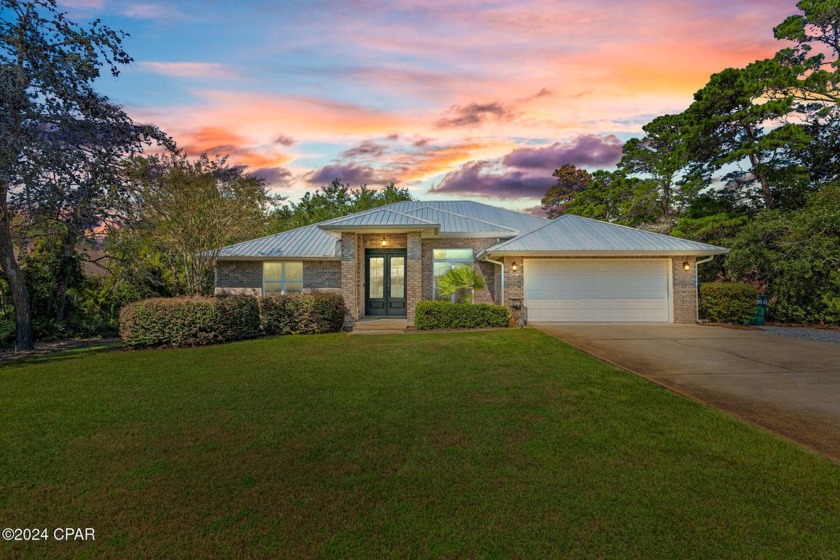 Nestled on an oversized lot, this single-level brick home in - Beach Home for sale in Santa Rosa Beach, Florida on Beachhouse.com