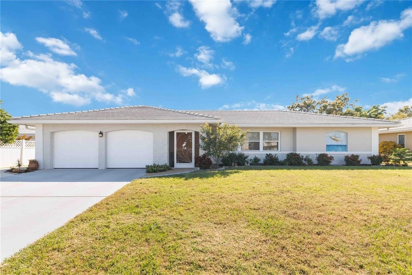 Experience quintessential Florida living in this spacious - Beach Home for sale in Sarasota, Florida on Beachhouse.com