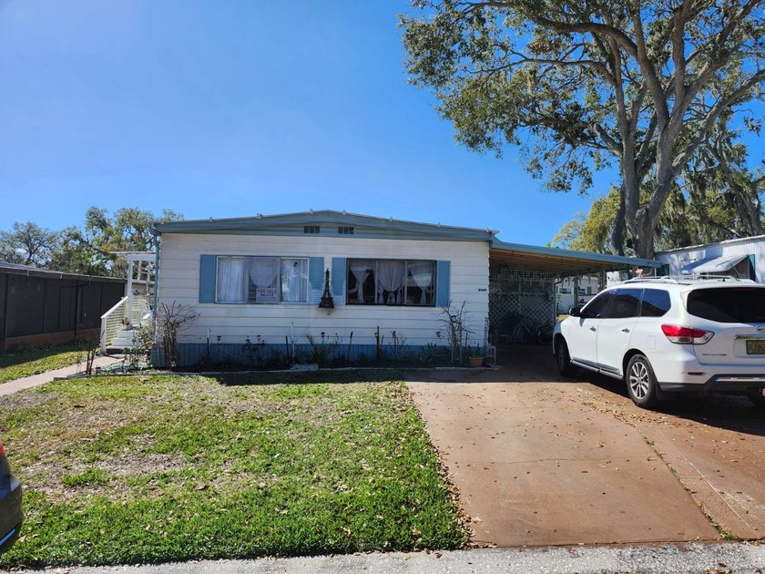 55+/75/3BD2BA/1456SQ/UPDATES/COVERED PORCH/SCREEN LANAI/HANDICAP - Beach Home for sale in Riverview, Florida on Beachhouse.com