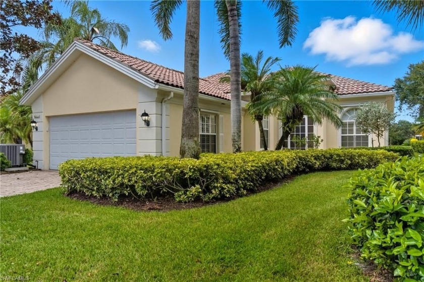 Enjoy beautiful sunsets in this lake front home in the desirable - Beach Home for sale in Naples, Florida on Beachhouse.com
