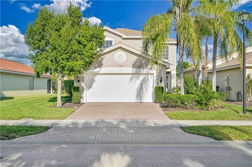 Welcome to your dream home in the desirable Botanica Lakes - Beach Home for sale in Fort Myers, Florida on Beachhouse.com