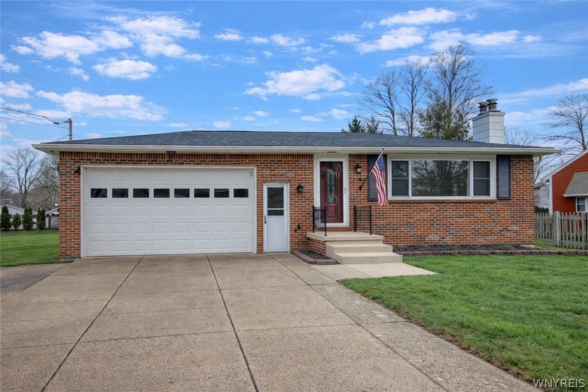 Welcome home to this 3-bedroom, partial brick ranch in the - Beach Home for sale in Derby, New York on Beachhouse.com