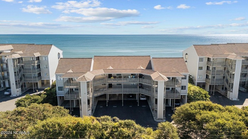 This stunning 2 bed, 2 bath oceanfront condo perches on the top - Beach Condo for sale in Pine Knoll Shores, North Carolina on Beachhouse.com