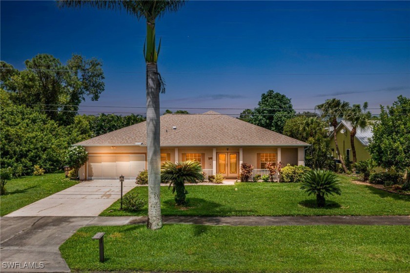 This charming 4-bedroom, 2-bath, 2-car garage home in the Mirror - Beach Home for sale in Lehigh Acres, Florida on Beachhouse.com