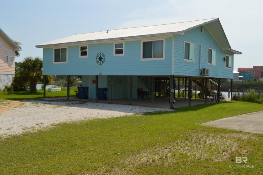BEAUTIFUL water views! This raised beach home has so many great - Beach Home for sale in Gulf Shores, Alabama on Beachhouse.com