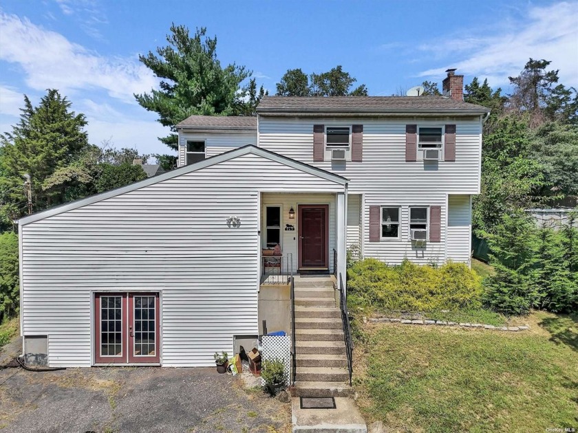 Sitting high in Rocky Point, this lovely 4 bedroom Colonial is - Beach Home for sale in Rocky Point, New York on Beachhouse.com