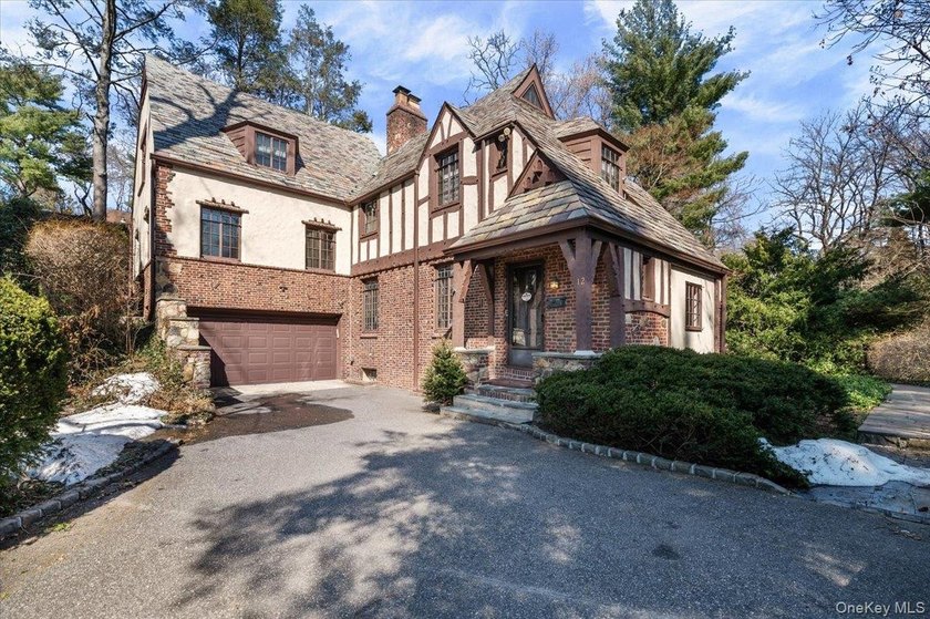 This bright and beautiful quintessential Tudor is located - Beach Home for sale in Port Washington, New York on Beachhouse.com