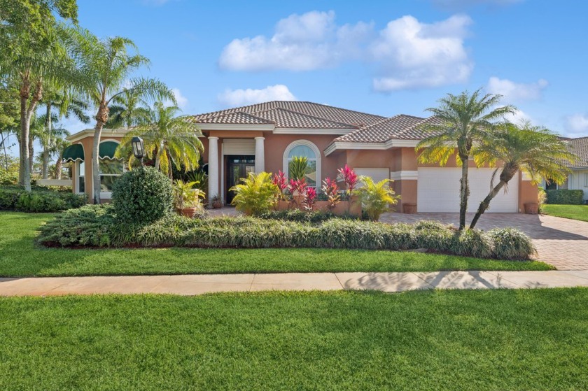 Discover this stunning 3 bedroom + office, 3 bath estate on one - Beach Home for sale in Boca Raton, Florida on Beachhouse.com