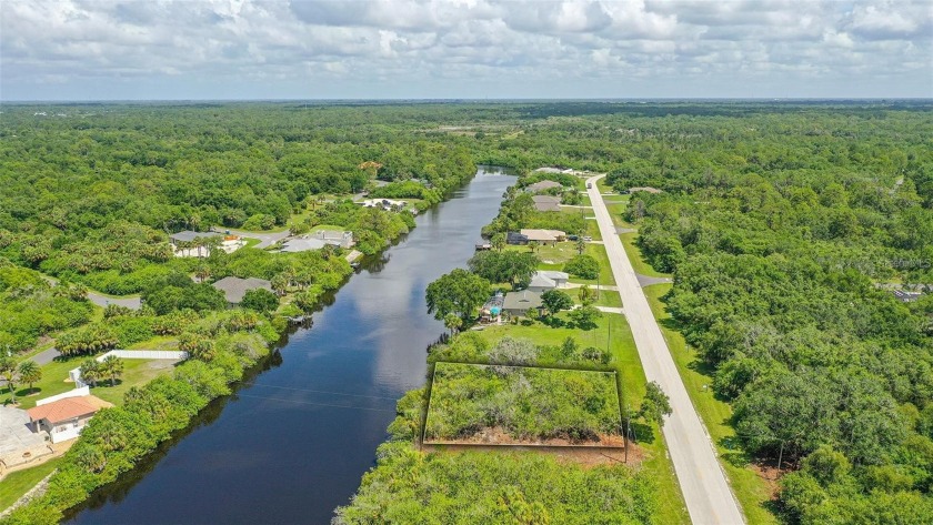 WATERFRONT LOT! This BUILDABLE CANAL LOT is located on Sam - Beach Lot for sale in Port Charlotte, Florida on Beachhouse.com