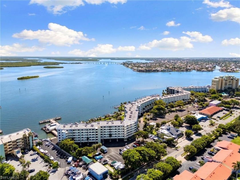 Welcome home to your own waterside oasis! With massive views of - Beach Condo for sale in Marco Island, Florida on Beachhouse.com