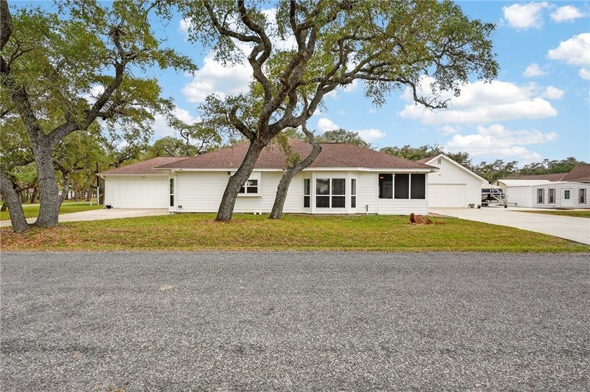 Nestled on a nicely landscaped spacious .66-acre corner lot in - Beach Home for sale in Rockport, Texas on Beachhouse.com