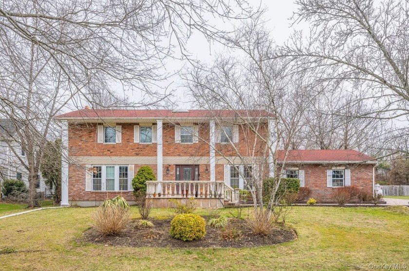 Spacious Brick Center Hall Colonial In Desirable Flower Hill - Beach Home for sale in Port Washington, New York on Beachhouse.com