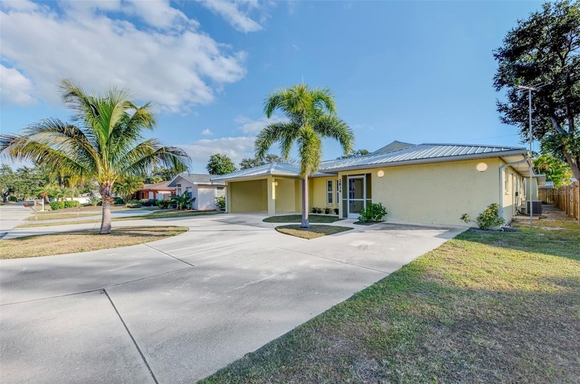 Don't miss this 3 bedroom, 2 bath, POOL HOME in the heart of it - Beach Home for sale in Sarasota, Florida on Beachhouse.com