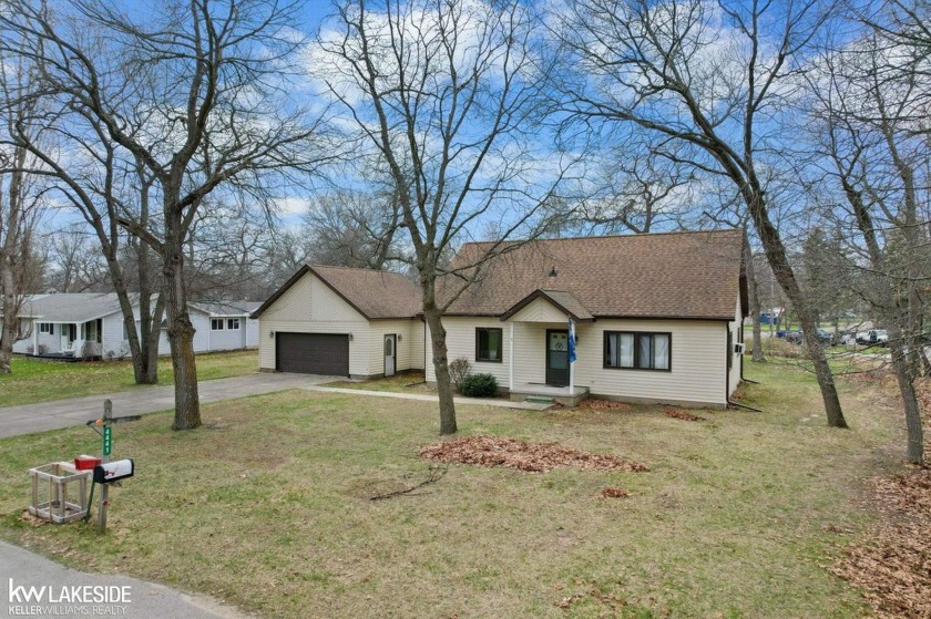 Welcome home to this well cared for, 3 bedroom 2 bath home in - Beach Home for sale in Caseville, Michigan on Beachhouse.com
