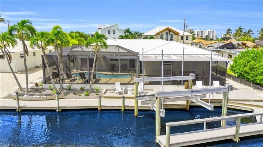 Experience Luxury Coastal Living in this expansive FOUR (4) Bed - Beach Home for sale in Fort Myers Beach, Florida on Beachhouse.com