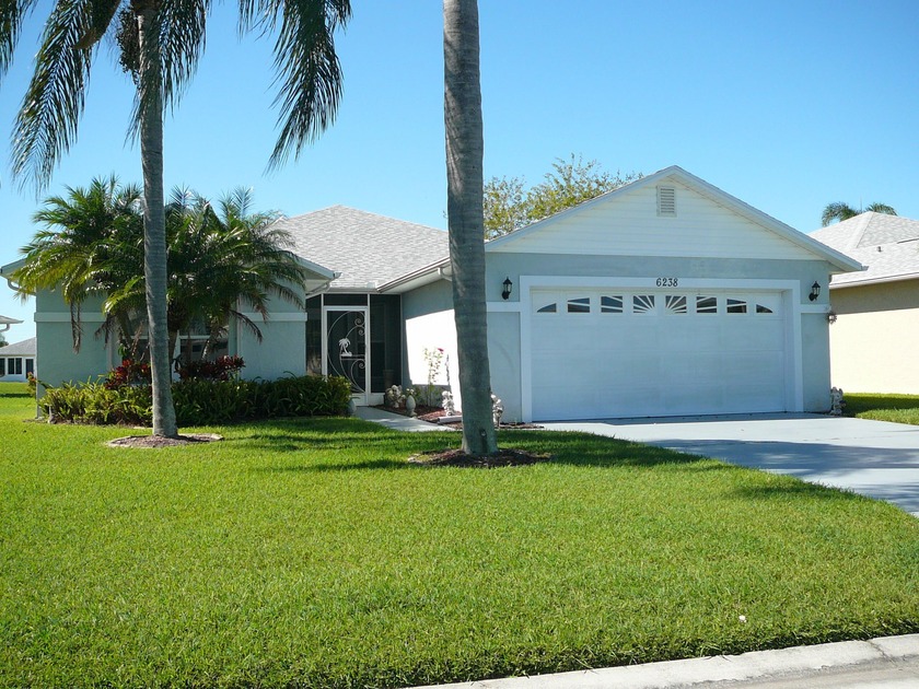 THIS 3/2/2 WATERFRONT CBS HOME IN THE ACTIVE ADULT GATED - Beach Home for sale in Fort Pierce, Florida on Beachhouse.com