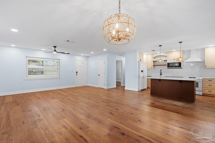 Step into this charming 3-bedroom, 2-bath home that perfectly - Beach Home for sale in Pensacola, Florida on Beachhouse.com